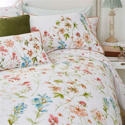 Duvet covers laura ashley - Product description. Product code: 62202001. Beautifully organic Picardie percale bedlinen features a large-scale floral with a wonderful collection of roses, foxgloves and buttercups delicately gathered across the duvet and flowing down the pillowcases. The design is is printed onto soft cotton and coloured in chalky pink hues.